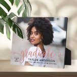 Modern Rose Gold Script Graduate Photo Graduation Plaque<br><div class="desc">Stylish and elegant graduation plaque sign with easel features a senior photo with "graduate" faux rose gold foil script overlay. Personalise the modern custom text with your grad's name,  school,  and class year. Makes a beautiful keepsake to display in your home!</div>