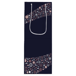 Modern rose gold snowflake waves in blue wine gift bag