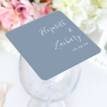 Modern Script Dusty Blue Wedding Square Paper Coaster<br><div class="desc">These simple,  modern wedding coaster favours feature white text aligned to the right margin on a dusty blue background. Add the names of the bride and groom in stylish handwriting calligraphy.</div>