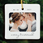 Modern Script Elegant Merry Married Wedding Photo Ceramic Ornament<br><div class="desc">This modern script Merry & Married Photo ornament featires two of your wedding photos on the front and back as well as your monograms and date of your celebration. This stylish keepsake will remind you of your big day for decades to come.</div>