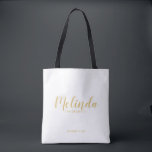 Modern Script Gold Personalised Bridesmaids Tote Bag<br><div class="desc">Modern Script Gold Personalised Bridesmaids Tote Bag featuring personalised bridesmaid's name in gold modern calligraphy font style with title and wedding date in modern sans serif font style on white background. Also perfect for Maid of Honour, Flower Girl, Mother of the Bride and more. Please Note: The foil details are...</div>