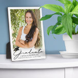 Modern Script Graduate Photo Keepsake Plaque<br><div class="desc">Simple DIY design with easy upload of your graduate's photo on this easel-back plaque featuring a modern, stylish script title GRADUATE accented with a black graduation cap and personalised with your graduate's name, school or college and class year. PHOTO TIP: Choose a photo with the subject in the middle and/or...</div>