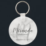 Modern Script Personalised Bridesmaid Key Ring<br><div class="desc">Add a personal touch to your wedding with personalised bridesmaid keychain. This keychain features personalised bridesmaid's name in grey modern script font style and monogram in light grey modern script font style as background with title and wedding date in grey modern sans serif font style on white marble background. Also...</div>