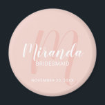 Modern Script Personalised Bridesmaid Magnet<br><div class="desc">Add a personal touch to your wedding with personalised bridesmaid magnet. This magnet features personalised bridesmaid's name in white modern script font style and monogram in blush pink modern script font style as background with title and wedding date in white modern sans serif font style on blush pink background. Also...</div>