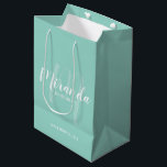Modern Script Personalised Bridesmaid Mint Green Medium Gift Bag<br><div class="desc">Personalised Bridesmaids Gift Bag featuring personalised bridesmaid's name in white modern script font style and monogram in light mint green modern script font style as background with title and wedding date in white modern sans serif font style on mint green background. Also perfect for maid of honour, flower girl, mother...</div>