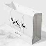 Modern Script Personalised Bridesmaids Large Gift Bag<br><div class="desc">Modern Script Personalised Bridesmaids Gift Bag
featuring personalised bridesmaid's name in black modern script font style with title and wedding date in modern sans serif font style on white background.

Also perfect for Maid of Honour,  Flower Girl,  Mother of the Bride,  Groomsmen,  Best man and more.</div>