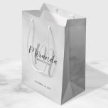 Modern Script Personalised Bridesmaids Medium Gift Bag<br><div class="desc">Personalised Bridesmaids Gift Bag featuring personalised bridesmaid's name in grey modern script font style and monogram in light grey modern script font style as background with title and wedding date in grey modern sans serif font style on white marble background. Also perfect for groomsman, best man, ring bearer, father of...</div>