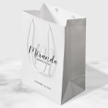Modern Script Personalised Bridesmaids Medium Gift Bag<br><div class="desc">Personalised Bridesmaids Gift Bag featuring personalised bridesmaid's name in grey modern script font style and monogram in light grey modern script font style as background with title and wedding date in grey modern sans serif font style on white background. Also perfect for groomsman, best man, ring bearer, father of the...</div>