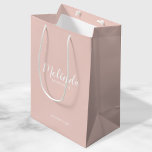 Modern Script Personalised Bridesmaids Medium Gift Bag<br><div class="desc">Modern Script Personalised Bridesmaids Gift Bag
featuring personalised bridesmaid's name in white modern script font style with title and wedding date in modern sans serif font style on blush pink background.

Also perfect for Maid of Honour,  Flower Girl,  Mother of the Bride and more.</div>