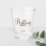 Modern Script Personalised Bridesmaids Shot Glass<br><div class="desc">Modern Personalised Bridesmaids Shot Glass
featuring personalised bridesmaid's name in modern calligraphy font style with title and wedding date in modern sans serif font style.

Also perfect for maid of honour,  flower girl,  mother of the bride,  groomsman,  best man,  father of the bride and more.</div>