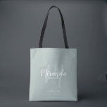 Modern Script Personalised Bridesmaids Tote Bag<br><div class="desc">Add a personal touch to your wedding with personalised bridesmaids gift tote bag. This tote bag features personalised bridesmaid's name in white modern script font style and monogram in sage green modern script font style as background with title and wedding date in white modern sans serif font style on sage...</div>