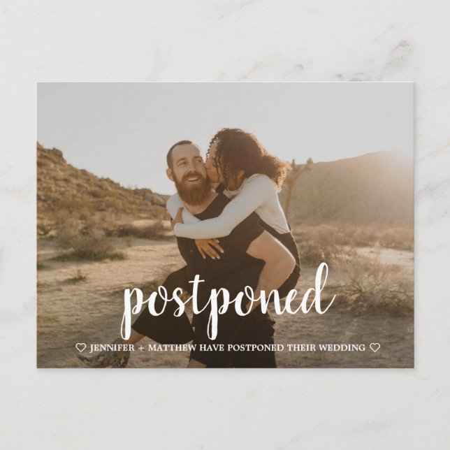 Modern Script Wedding Postponement Date Change Postcard (Front)
