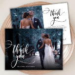 Modern Stylish Calligraphy Script 2 Photo Wedding  Thank You Card<br><div class="desc">Elegant Modern Boho Chic Calligraphy Script Wedding 2 Photo Thank You Card. Stylish wedding thank you template featuring a full vertical photo on the front with the text "Thank You" in a whimsical swirly hand lettering typography script swash tail font overlay on the picture and a reverse side one (1)...</div>