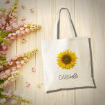 Modern Sunflower Floral Rustic  Tote Bag<br><div class="desc">Modern floral tote bag,  with a rustic yellow sunflower bloom image. With black script lettering,  you can personalise the text to make a great custom accessory. Perfect for keeping your items together when you are on the go.</div>