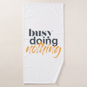 Modern, trendy, urban design of Busy Doing Nothing Bath Towel