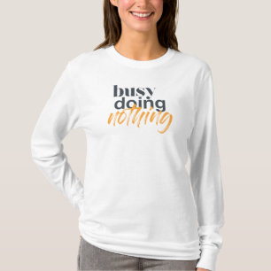 Modern, trendy, urban design of Busy Doing Nothing T-Shirt