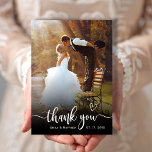 Modern Typography 2 Photo Wedding Thank You Card<br><div class="desc">Modern Elegant Heart Typography Wedding 2 Photo Thank You Card. Stylish Minimalist wedding thank you template featuring a full vertical photo on the front with the text "Thank You" in a hand lettered calligraphy swash tail script font overlay with love heart motif in white on the picture. At the back...</div>