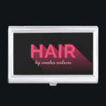 Modern Typography Black and Pink Hair Stylist Business Card Holder<br><div class="desc">Store your business cards in this modern black and pink "Hair" typography business card holder. Check out the matching business card here https://www.zazzle.com/modern_typography_black_and_pink_hair_stylist_business_card-240984155131985968?rf=238364477188679314 Personalise this by replacing the placeholder text to add your own information. For more options such as to change the font and it's size click the "Customise it"...</div>