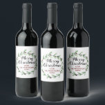 Modern Watercolor Holly Wreath Christmas Wine Label<br><div class="desc">The gift of giving is made easy this holiday season with these unique and modern Christmas bottle labels. The design features a festive watercolor holly wreath with "Merry Christmas" script wording. Easily add your custom wording to these holiday bottle labels by using the "Edit this design template" section, or click...</div>