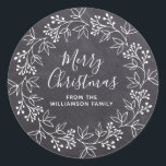 Modern White Christmas Wreath Black Chalkboard Classic Round Sticker<br><div class="desc">This black and white Christmas sticker takes the traditional chalkboard style and adds a modern touch. The Christmas wreath is drawn in the popular open style. Merry Christmas is also written in a contemporary font. Your name is below. Easy-to-use template. All of the text can be quickly changed.</div>
