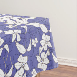 Modern white flowers on a periwinkle  tablecloth