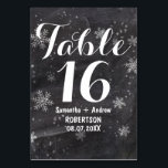 Modern winter snowflakes chalkboard table number<br><div class="desc">Modern winter snowflakes chalkboard table number. stylish,  elegant and original black chalkboard with white snowflakes background. A black and white elegant wedding theme perfect for winter wonderland,  Christmas wedding theme.The text is fully customisable</div>