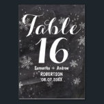 Modern winter snowflakes chalkboard table number<br><div class="desc">Modern winter snowflakes chalkboard table number. stylish,  elegant and original black chalkboard with white snowflakes background. A black and white elegant wedding theme perfect for winter wonderland,  Christmas wedding theme.The text is fully customisable</div>