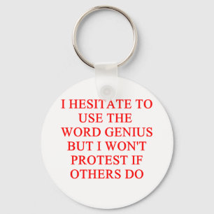 modest genius joke key ring