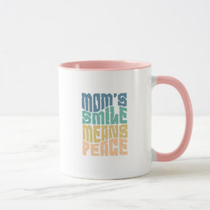 Mom’s Smile Means Peace – Green & Orange Mug