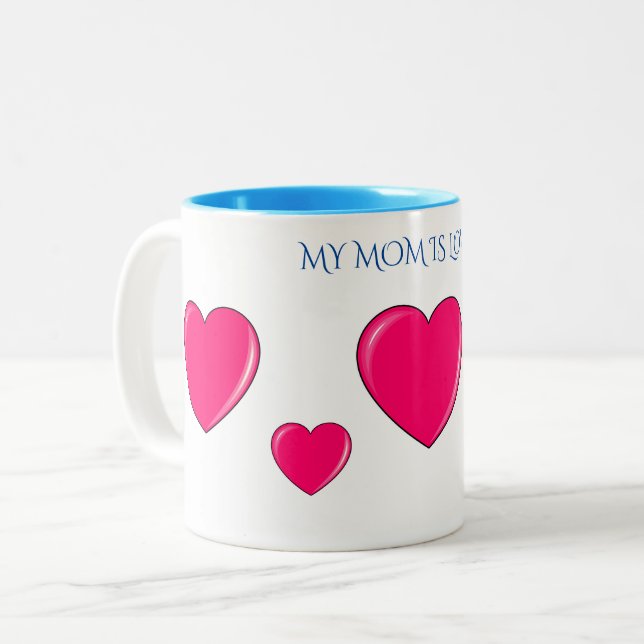 "MOM" with pink hearts coffee or tea mug. Two-Tone Coffee Mug (Front Left)