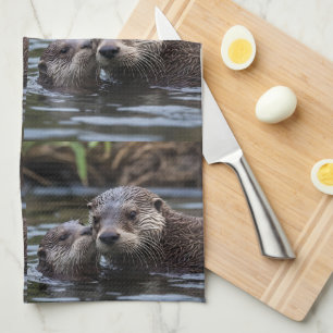 Mommy And Baby Otter Having A Cuddle In The River, Tea Towel