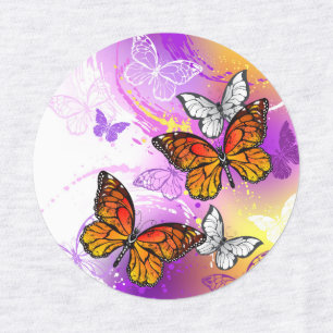 Monarch Butterflies on Purple Background
