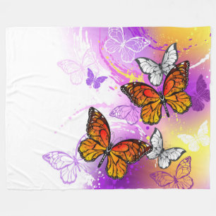 Monarch Butterflies on Purple Background Fleece Blanket