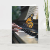 Monarch Butterfly On a Piano Keyboard