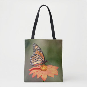 Monarch Butterfly on an orange flower Tote Bag