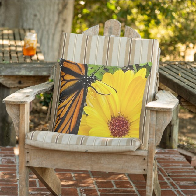 Monarch butterfly on calendula flower cushion (Chair)