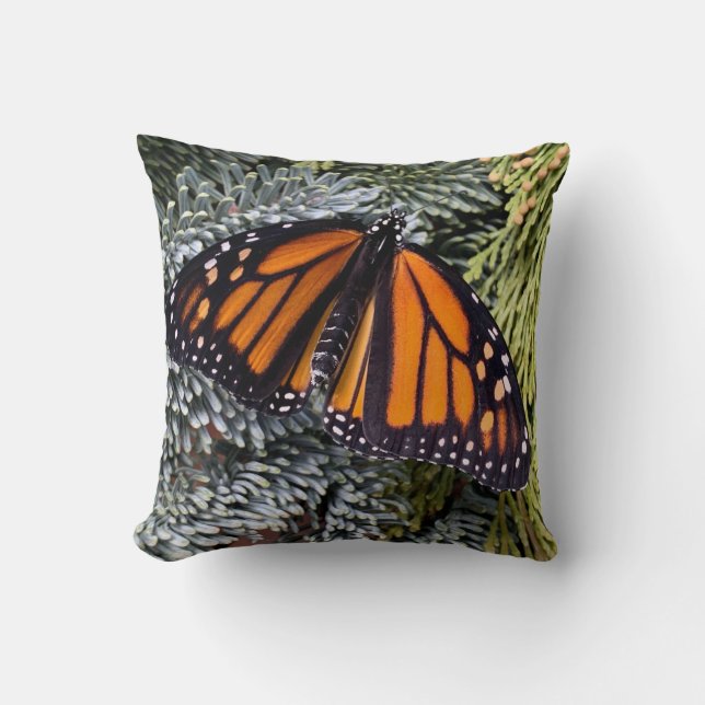 Monarch butterfly on evergreens cushion (Front)