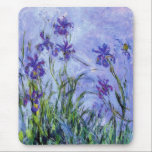 Monet Lilac Irises Mouse Pad<br><div class="desc">Monet Lilac Irises mouse pad. Oil painting on canvas from 1917. Monet painted irises throughout his career, this is one of his final iris paintings and certainly one of his most haunting. The work is heavily impressionistic and the dark purple irises almost seem to be floating in water above their...</div>