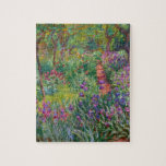 Monet “The Iris Garden at Giverny” Jigsaw Puzzle<br><div class="desc">Monet was a founder of French Impressionist painting, of which “The Iris Garden at Giverny” (painted between 1899 and 1900) is a beautiful example. It’s a celebration of colour, light and movement. When Monet purchased the Giverny estate, he redesigned the flower garden already planted on its grounds. His preference for...</div>