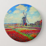 Monet Tulips Windmill 10 Cm Round Badge<br><div class="desc">Button featuring Claude Monet’s flower and windmill painting. Beautiful and colourful fields of red,  pink,  and yellow tulips next to a windmill and house in Holland. A great Monet gift for fans of impressionism and French art.</div>