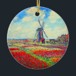 Monet Tulips Windmill Ceramic Tree Decoration<br><div class="desc">Ceramic Ornament featuring Claude Monet’s flower and windmill painting. Beautiful and colourful fields of red,  pink,  and yellow tulips next to a windmill and house in Holland. A great Monet gift for fans of impressionism and French art.</div>