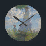 Monet's Woman with a parasol Round Clock<br><div class="desc">Claude Monet's masterpiece: Woman with a parasol.
Please visit our store for othe rmatchin items</div>