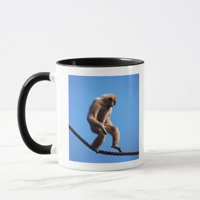 Monkey walking on rope mug (Left)