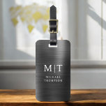 Monogram Black Brushed Metallic Elegant Luggage Tag<br><div class="desc">Elevate your travel experience with our Classic Elegant Modern Minimalist Monogram Luggage Tag. This meticulously designed accessory seamlessly combines timeless elegance with contemporary minimalism, ensuring your luggage stands out with sophistication. Crafted with precision and attention to detail, this luggage tag is more than just a practical item; it's a personalised...</div>