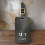 Monogram Black Brushed Metallic Elegant Luggage Tag<br><div class="desc">Elevate your travel experience with our Classic Elegant Modern Minimalist Monogram Luggage Tag. This meticulously designed accessory seamlessly combines timeless elegance with contemporary minimalism, ensuring your luggage stands out with sophistication. Crafted with precision and attention to detail, this luggage tag is more than just a practical item; it's a personalised...</div>
