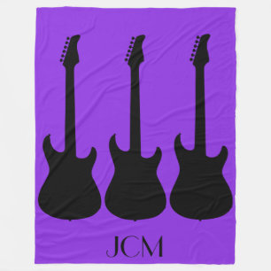 Monogram Black Electric Guitars on Purple Fleece Blanket
