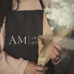 Monogram Black Minimal Apron<br><div class="desc">Elevate your kitchen style with this Monogram Black Minimalist Apron. Featuring a sleek and simple design, this apron combines functionality with elegance, making it perfect for both home cooks and professional chefs. The customisable monogram adds a personal touch, ensuring that you cook in style. Made from durable materials, this apron...</div>