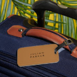 Monogram black minimalist brown luggage tag<br><div class="desc">A sleek and timeless monogram takes centre stage against a rich brown background,  capturing minimalist elegance in its purest form. The juxtaposition of black initials on the warm backdrop creates a balanced and distinguished design,  ideal for adding a touch of personal refinement to any setting.</div>