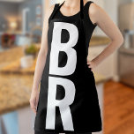 Monogram Bold Modern Black Apron<br><div class="desc">Introducing our personalised masterpiece, the Monogrammed Maven Apron, where function meets fashion. Elevate your culinary adventures with this exquisitely designed apron adorned with a bold and oversized monogram. Your kitchen is your castle, and you are the reigning chef deserving of an apron that's as unique and bold as your recipes....</div>