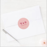 Monogram Chic Retro Hot Pink & Blush Wedding Classic Round Sticker<br><div class="desc">Add a playful yet elegant touch to your wedding details with the Monogram Chic Retro Hot Pink & Blush Wedding Classic Round Sticker. Featuring a stylish monogram in retro typography with a bold hot pink and blush colour palette, this sticker is perfect for sealing envelopes, decorating favours, or enhancing your...</div>